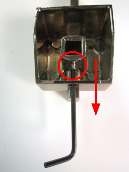  If you are installing a new handle and wish to re-use the set screw from the previous handle, use the hex wrench to uncrew the screw until it is completely removed.