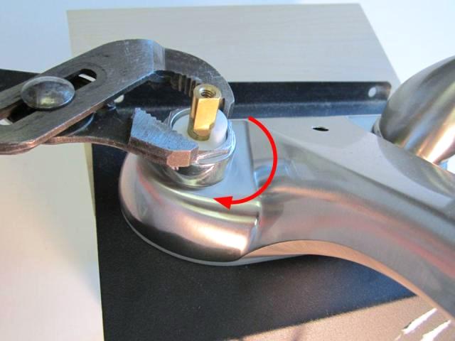 Re-install the locking nut with a pair of adjustable pliers. In order to avoid over tightening the locking nut, hand tighten the locking nut, and then use the adjustable pliers to apply a quarter turn. Approximately 10-14 lbs of torque are required to properly install the locking nut.