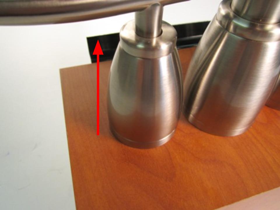 Once the handle base is loosened, pull the handle away from the faucet body. The handle should come off easily.