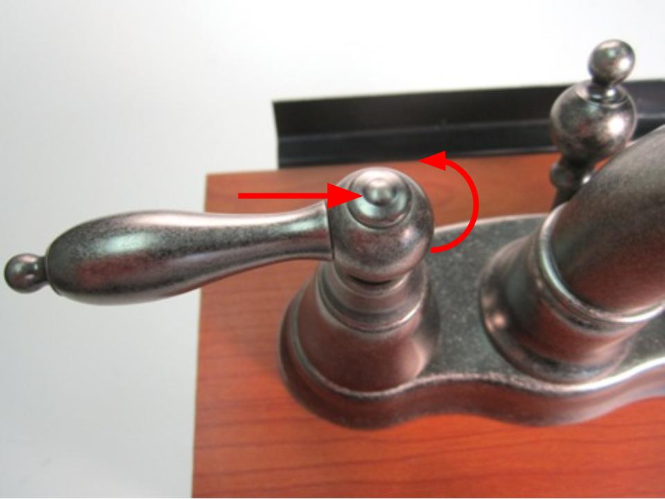 Remove the handle cap. To do so, uncrew the handle cap counter-clockwise.