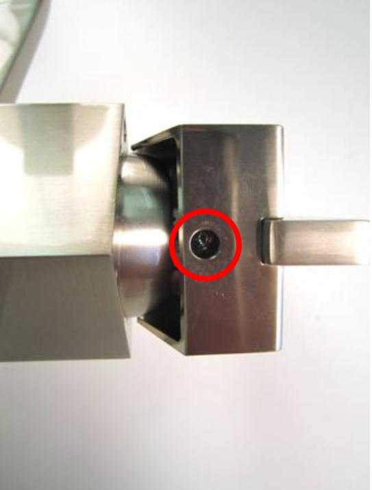 With the rubber cap removed, you should now have access to the set screw.