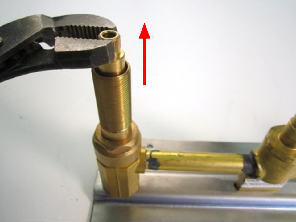 Remove the handle adapter  (if applicable).