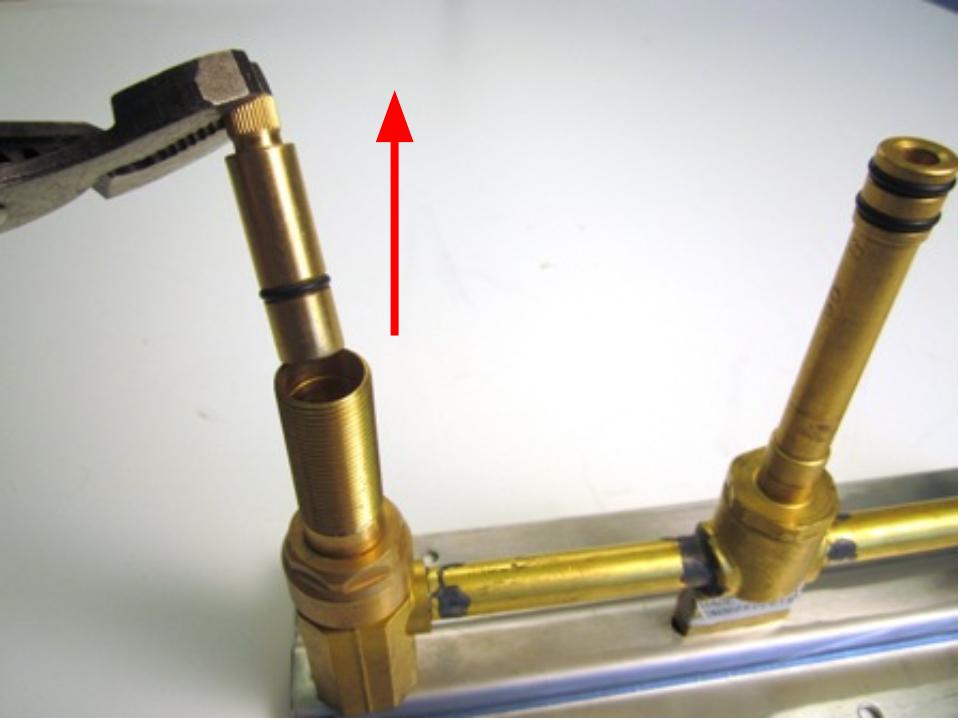 Remove the handle adapter  (if applicable).
