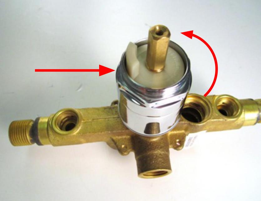 Remove the trim cap by turning counter-clockwise.