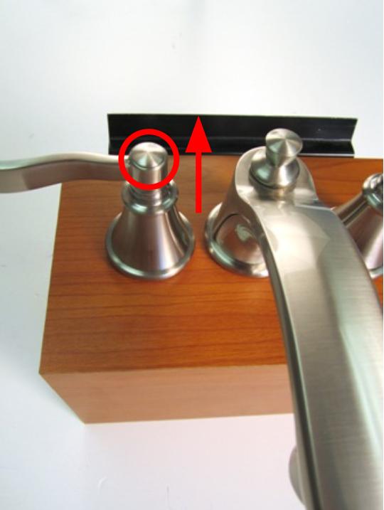 If the handle cap does not unscrew, use a flat-head screwdriver to remove the handle cap.