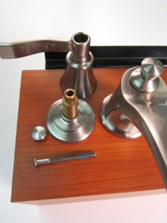 Once the screw is removed, pull the handle away from the faucet body. The handle should come off easily.