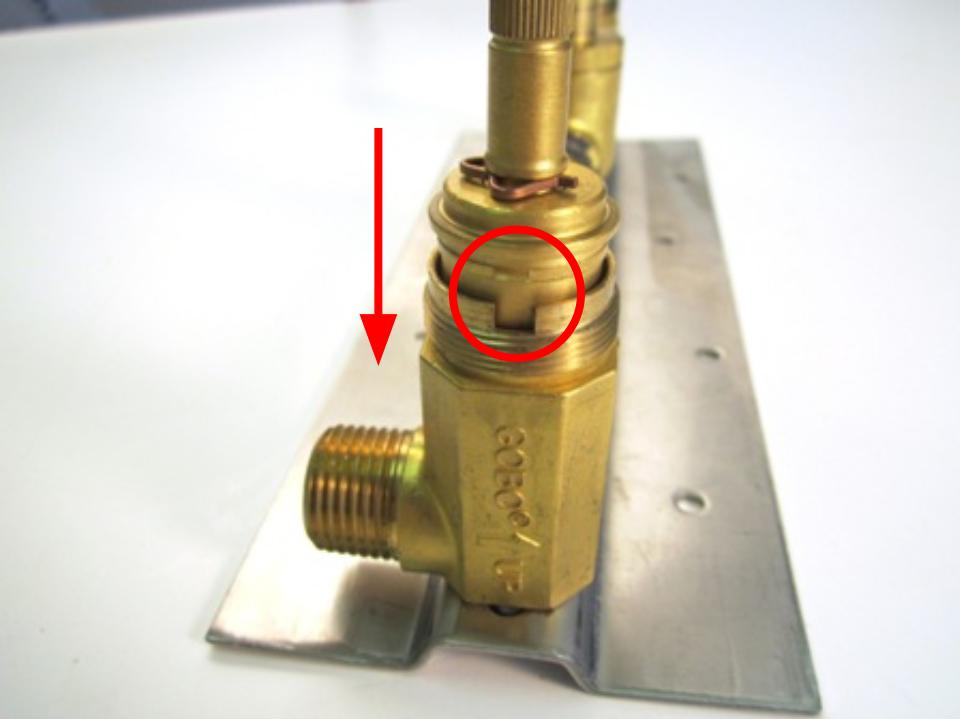 To install the new cartridge, slide the cartridge into the faucet body and rotate the cartridge until the notches on the cartridge line up with the openings in the faucet body