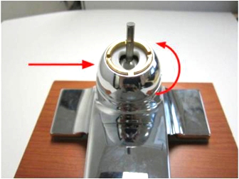 After removing the handle, remove the trim cap and locking nut by unscrewing the trim cap counter-clockwise.