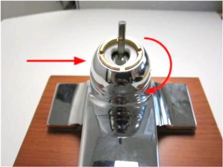 Install the trim cap. Once installed, tighten the brass locking nut onto the ball valve