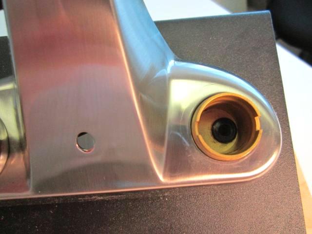 Next, install the rubber seat over the spring.