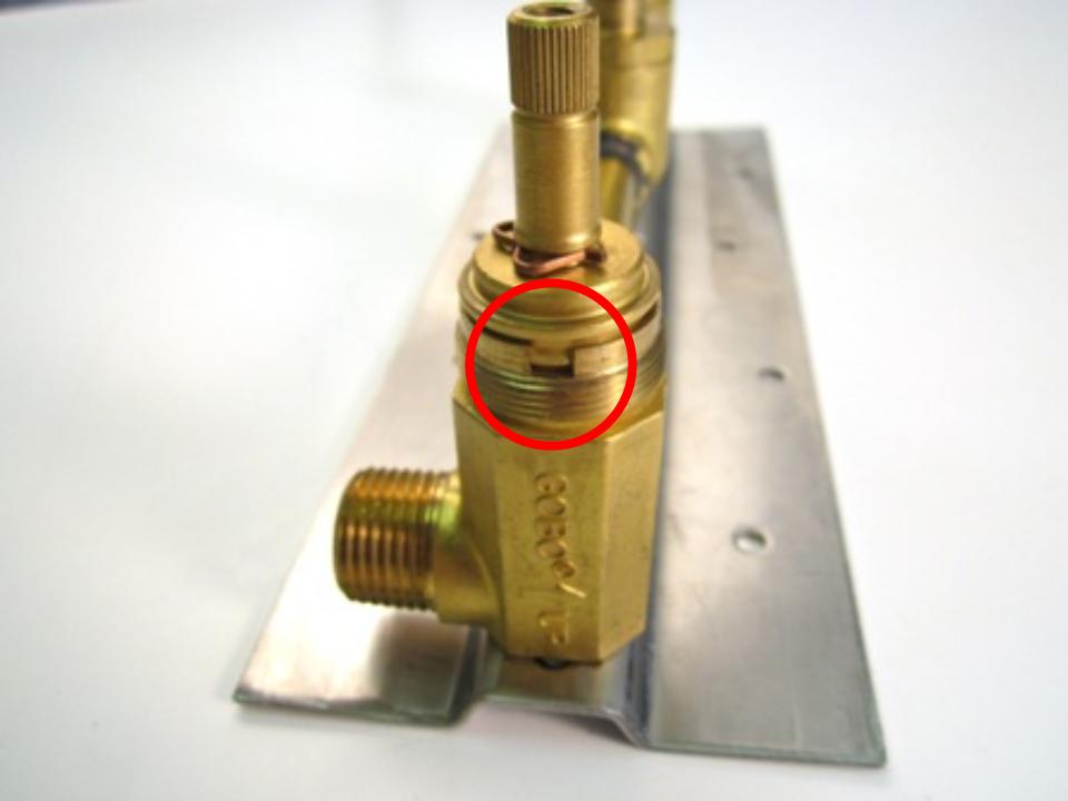 To install the new cartridge, slide the cartridge into the faucet body and rotate the cartridge until the notches on the cartridge line up with the openings in the faucet body