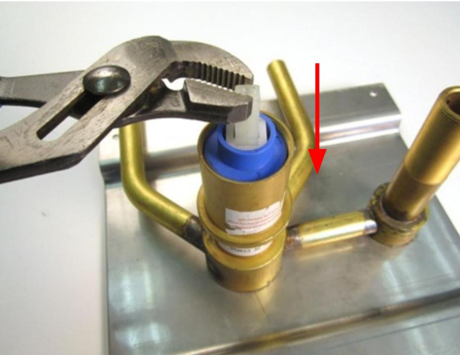 Insert the cartridge and rotate it until it slides down into place.