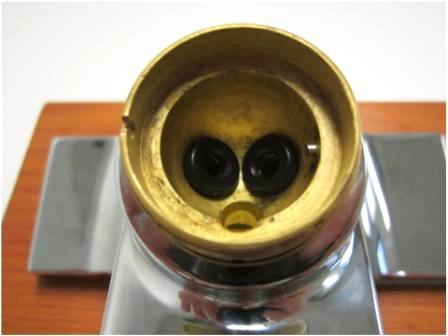 Next, install the rubber seat over the spring. Make sure that you install both sets of seats and springs.