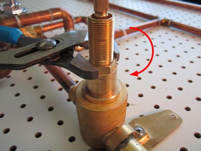 Insert the new cartridge into the faucet body and screw it into the faucet body by turning clockwise. In order to avoid over tightening the locking nut, hand tighten the locking nut, and then use the adjustable pliers to apply a quarter turn. Approximately 10-14 lbs of torque are required to properly install the locking nut.