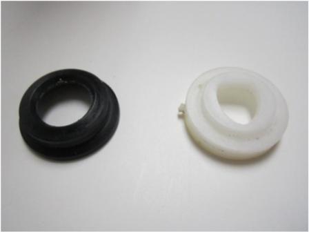 Insert the cam (pictured on the right) and cam packing (pictured on the left). 