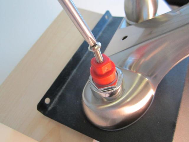 Re-install the handle adaptor (if applicable).