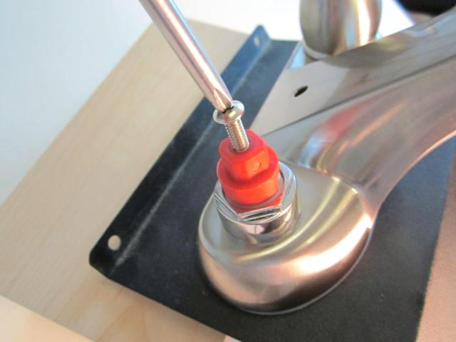 Re-install the handle adaptor (if applicable)
