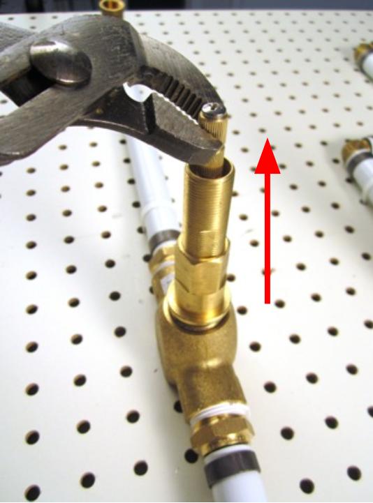 Hold the stem of the cartridge and pull out until the cartridge is completely removed from the faucet body.