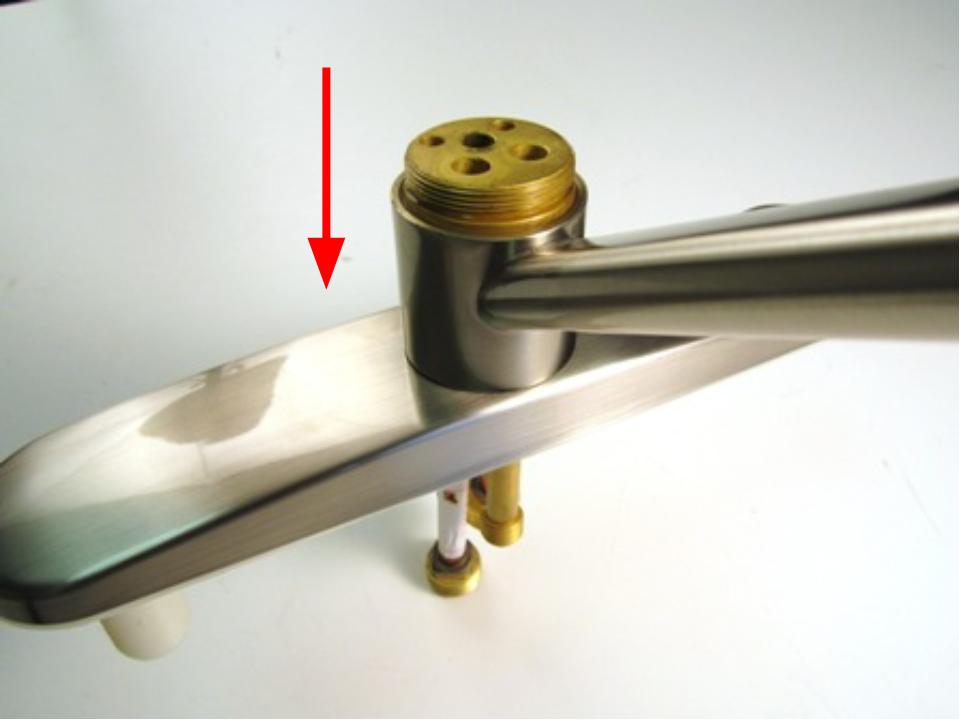Re-install the spout. Once the spout is installed, turn the faucet on and let the water run for 10 minutes. Watch closely for any leaks.