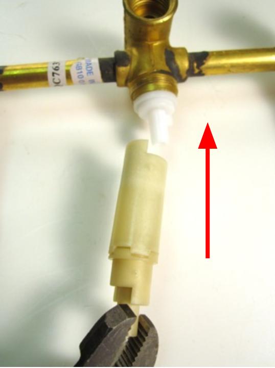 Re-install the stem extension. If the two pieces of the stem extension have separated, connect them by lining up the matching notches.