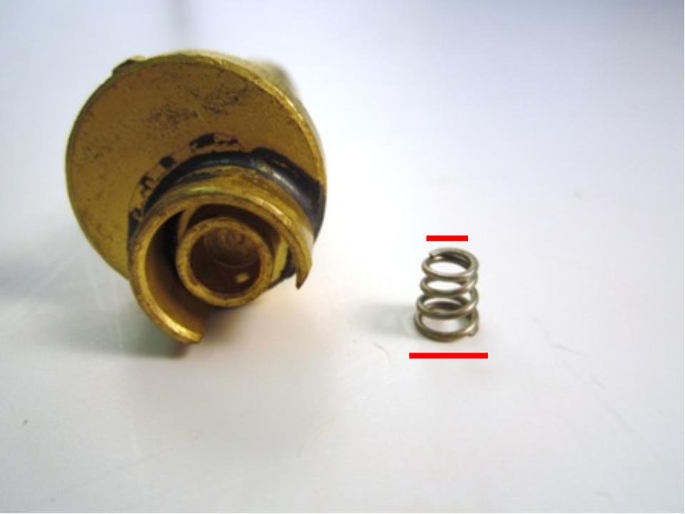Insert the spring into the diverter. Note that the larger end of the spring is inserted first.