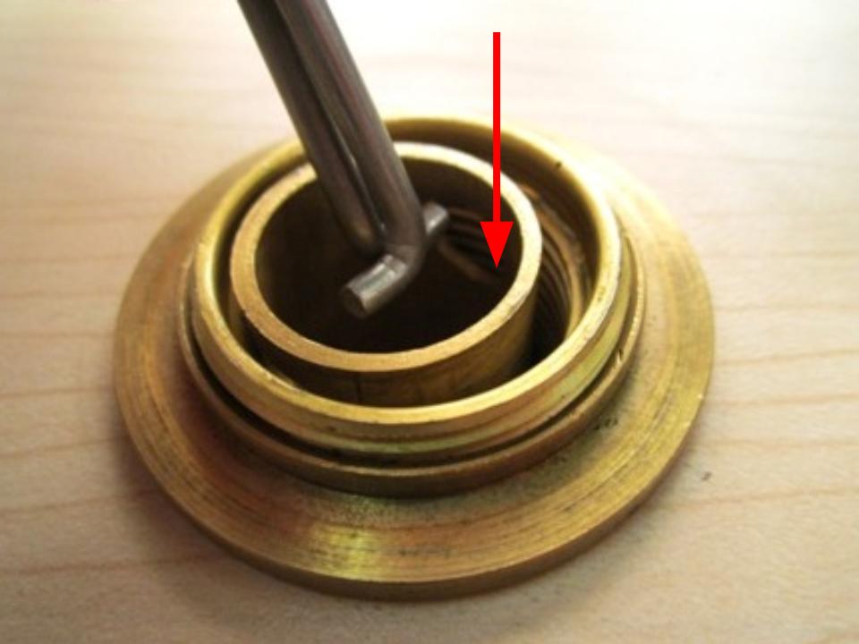 Pinch the diverter tool together and insert the tool into the diverter.