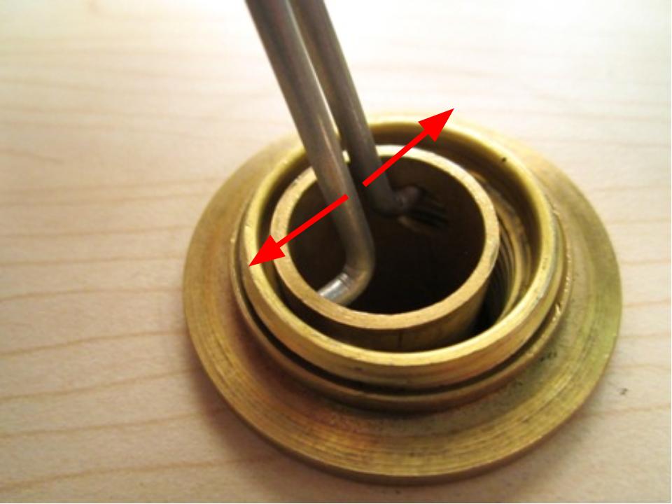 Pinch the diverter tool together and insert the tool into the diverter.