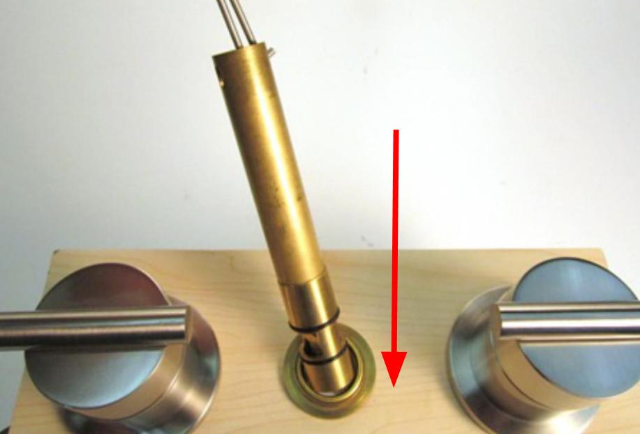 To install the new diverter, slide it into the spout body and push down until it stops.