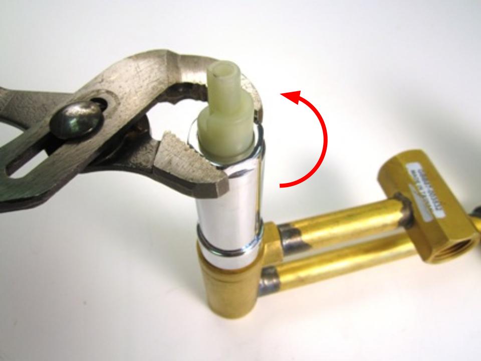  After removing the handle, remove the threaded sleeve by twisting counter-clockwise with a wrench.