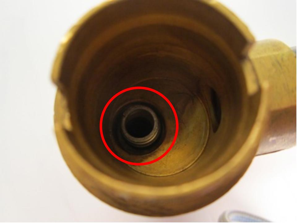 Install the new seats and springs. To do so, insert the spring into the faucet body. The larger end of the spring goes in first.