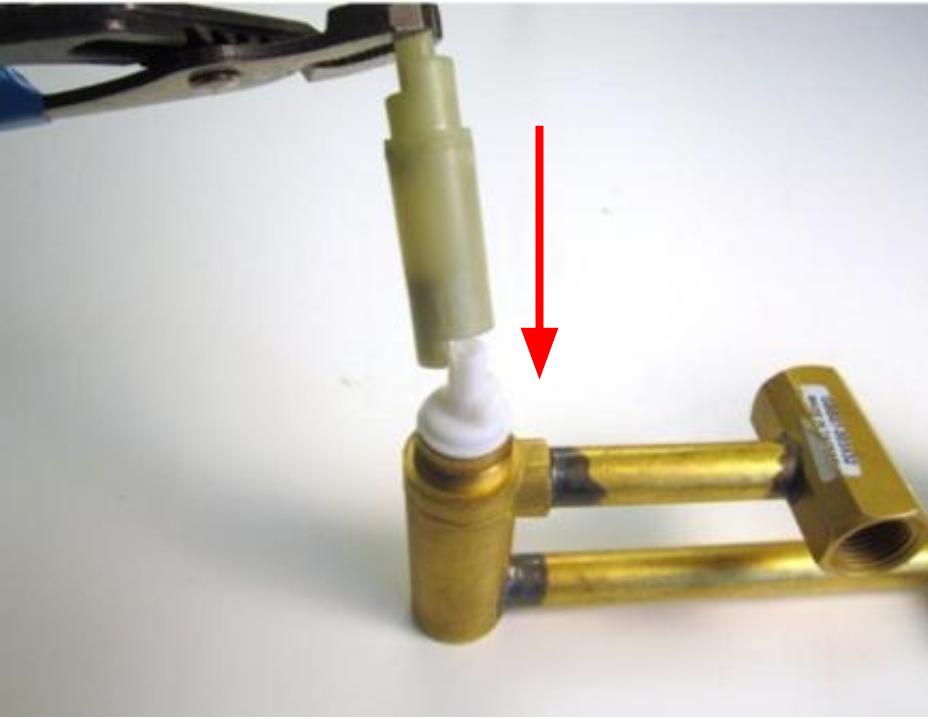  Insert the cartridge into the valve body.  When installing these parts into the valve, make sure the flat side of the D-shaped stem is facing left.