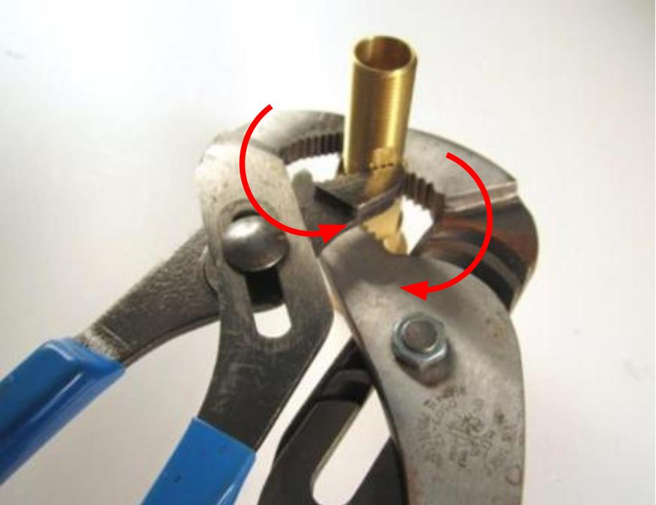  Remove the threaded sleeve. To do so you will need two pairs of adjustable pliers. Using one pair of adjustable pliers, hold the cartridge in place. Using the second pair of adjustable pliers, unscrew the threaded sleeve counter-clockwise until it is completely removed.
