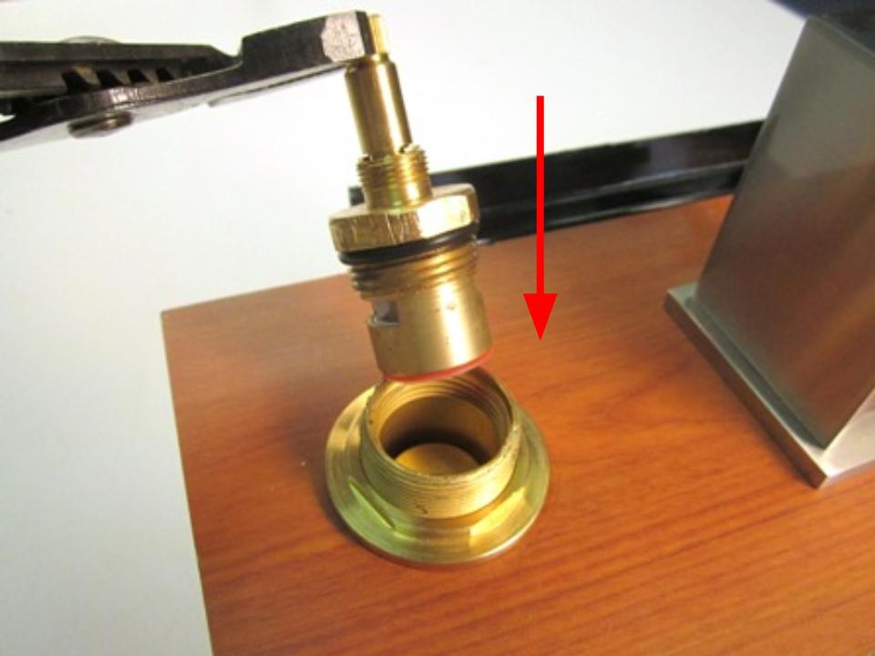 To install the new cartridge, sit the cartridge into the faucet body.