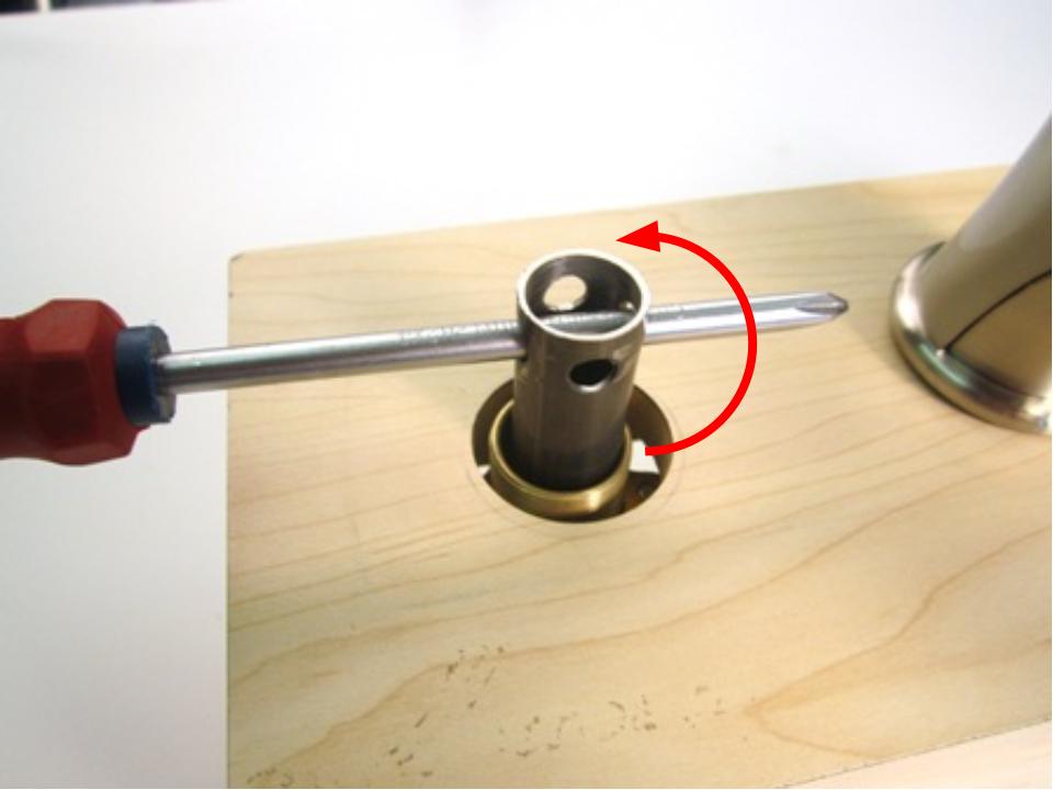 If the cartridge is installed without a locking nut, you may have a new style of cartridge that requires a tool to remove the cartridge. If this is the case, use the tool to unscrew the cartridge from the faucet body.