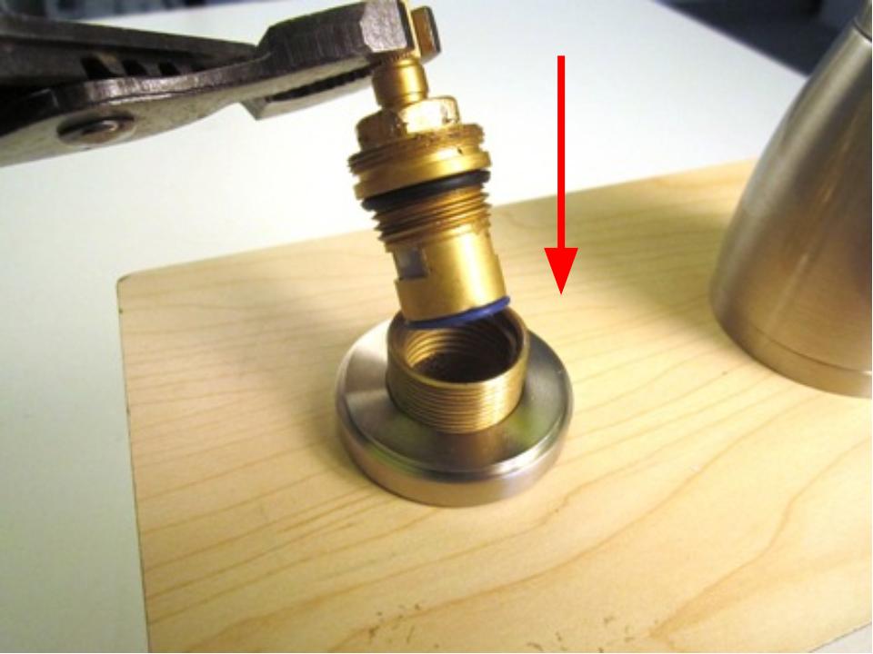 Slide the cartridge into the faucet body