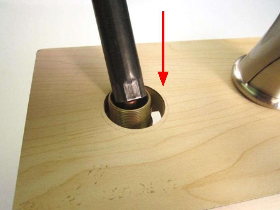 Insert the cartridge removal tool into the handle body