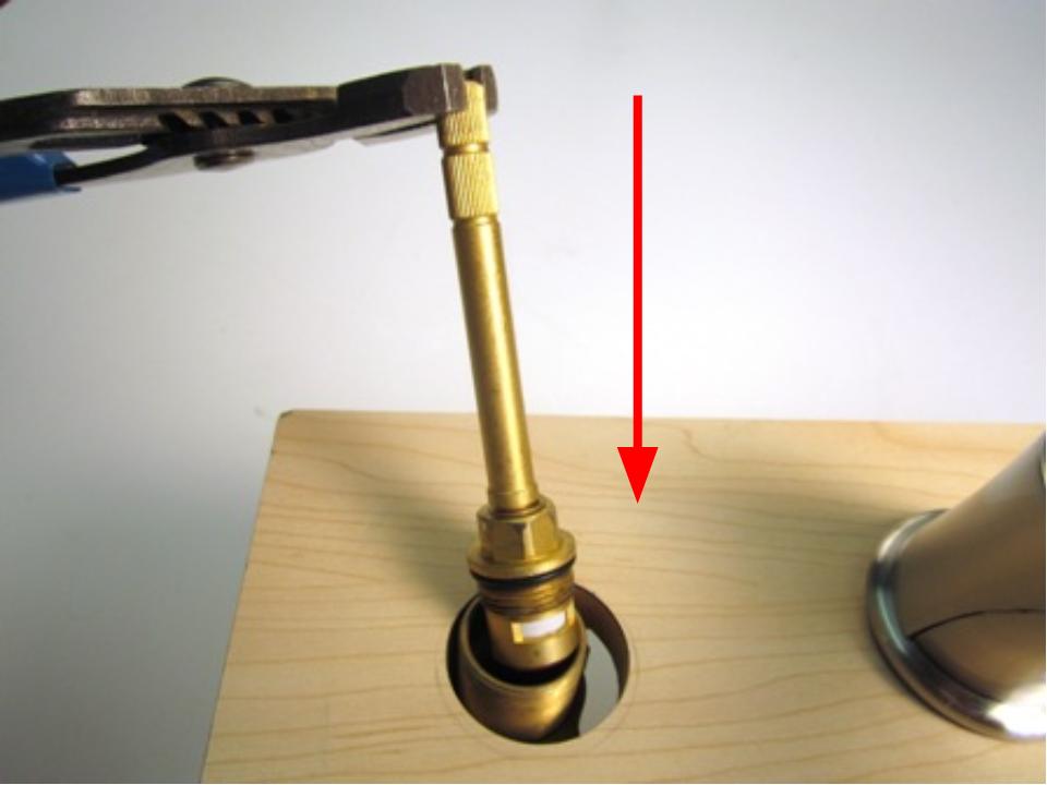Slide the cartridge into the faucet body