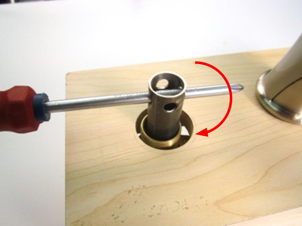 use the tool to tighten the cartridge onto the faucet
